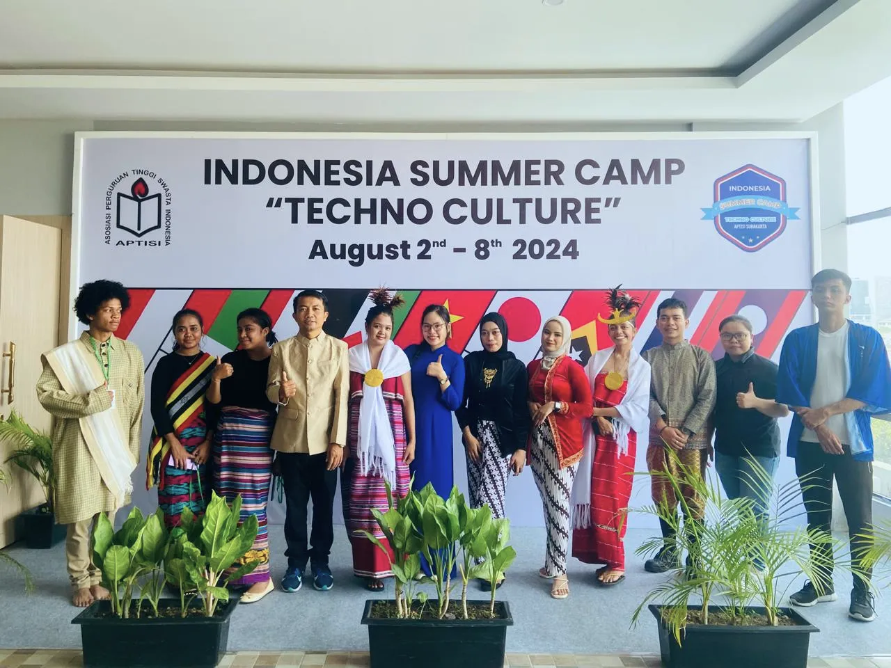 Abdulrahim E-sor representing Thailand at Indonesia Summer Camp Techno Culture 2024, standing with international student delegates from various countries